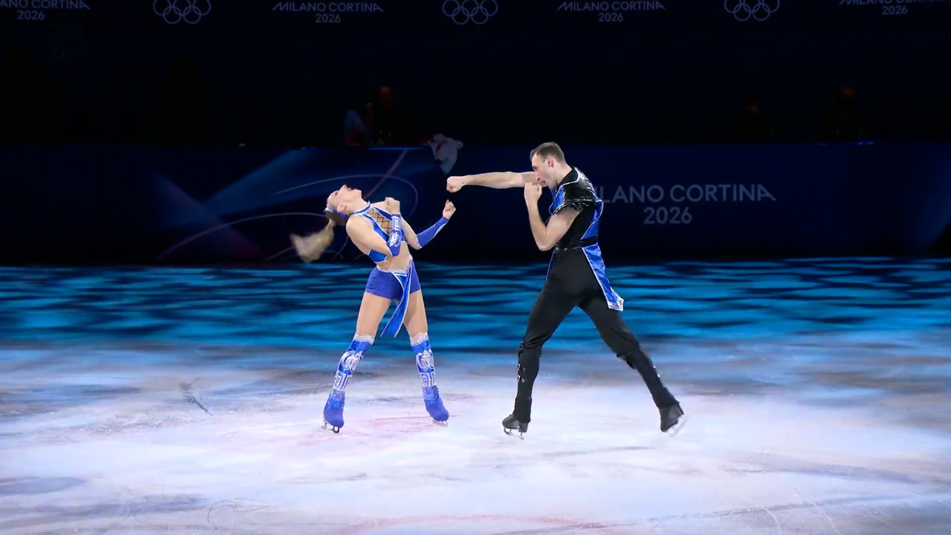 Olympic figure skaters celebrate their milestone medal win with a Mortal Kombat routine